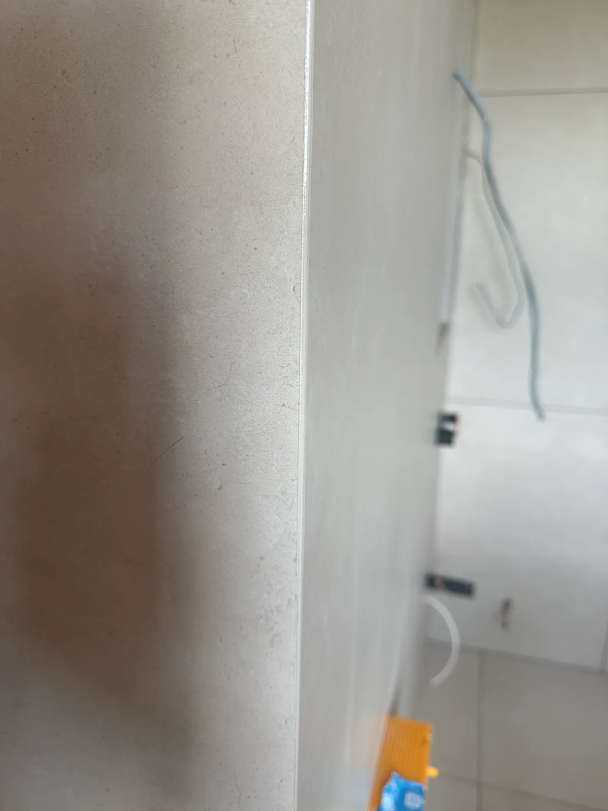Mitred tile edge colour matched to the tile
