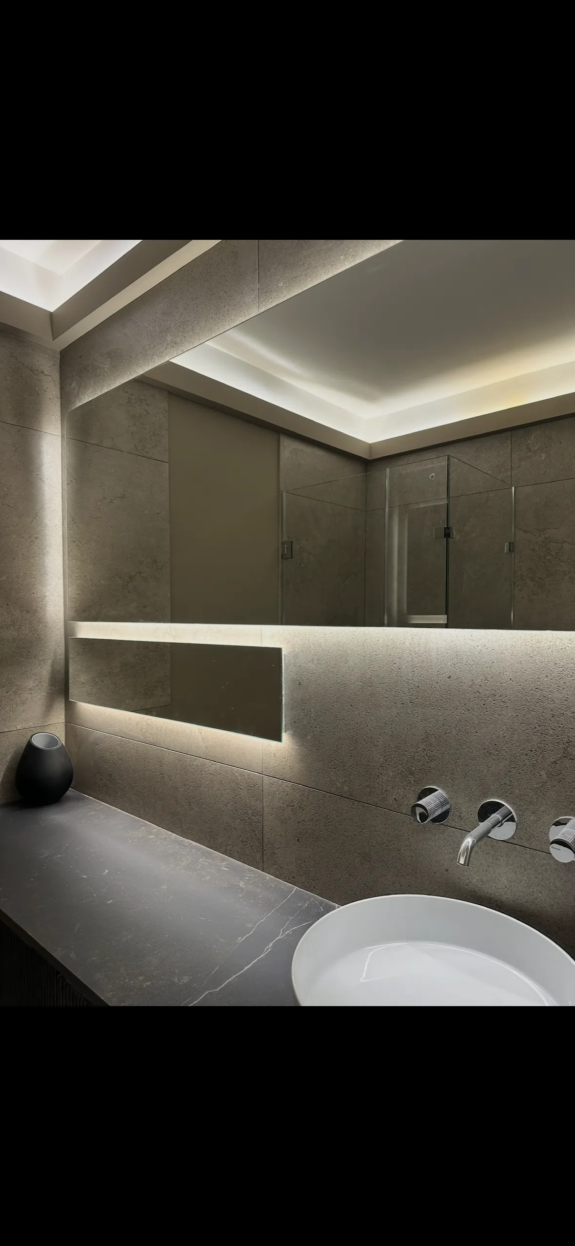 Light up mirrors on tiled walls